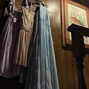 Beautiful long sheer baby blue sleeveless flowing dress with tiers of fabric